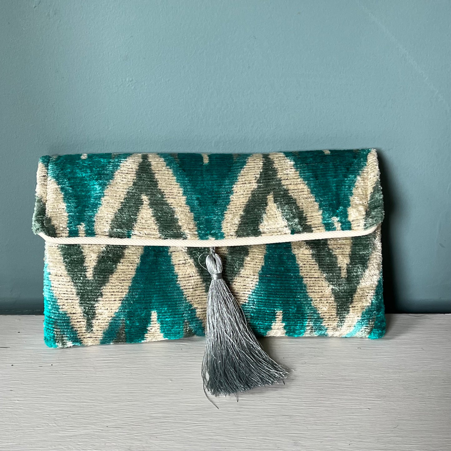 Green, blue, off white Ikat clutchbag