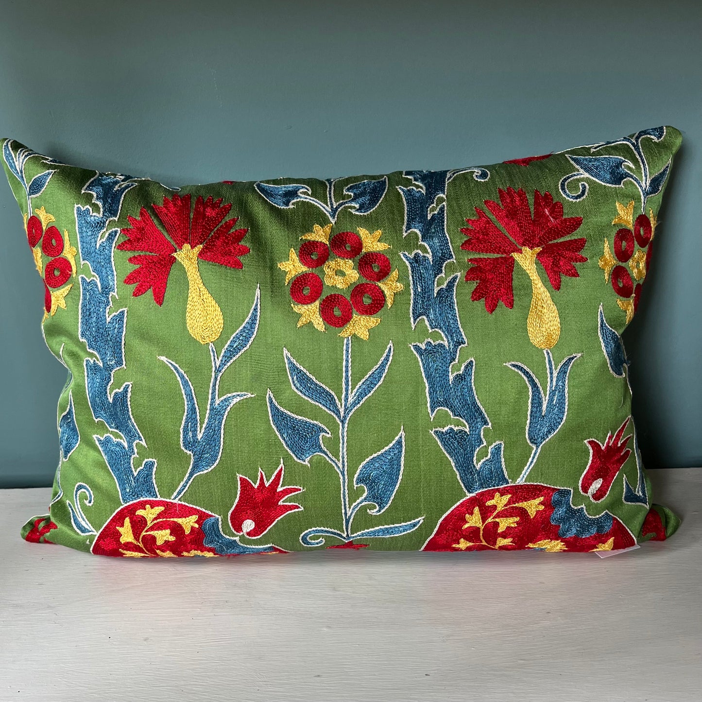 Hand embroided red Suzani cushion